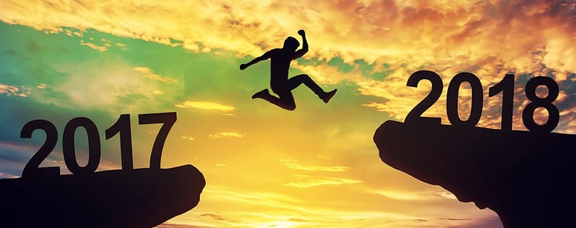 Man jumping over gap between 2017 and 2018 Man jumping over gap between 2017 and 2018